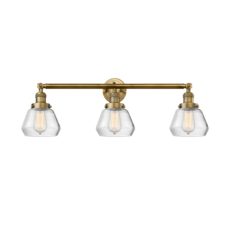 Fulton Bath Vanity Light shown in the Brushed Brass finish with a Clear shade