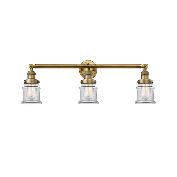 Canton Bath Vanity Light shown in the Brushed Brass finish with a Clear shade