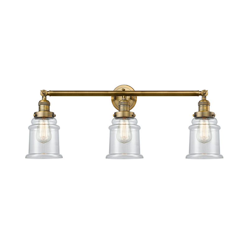 Canton Bath Vanity Light shown in the Brushed Brass finish with a Clear shade