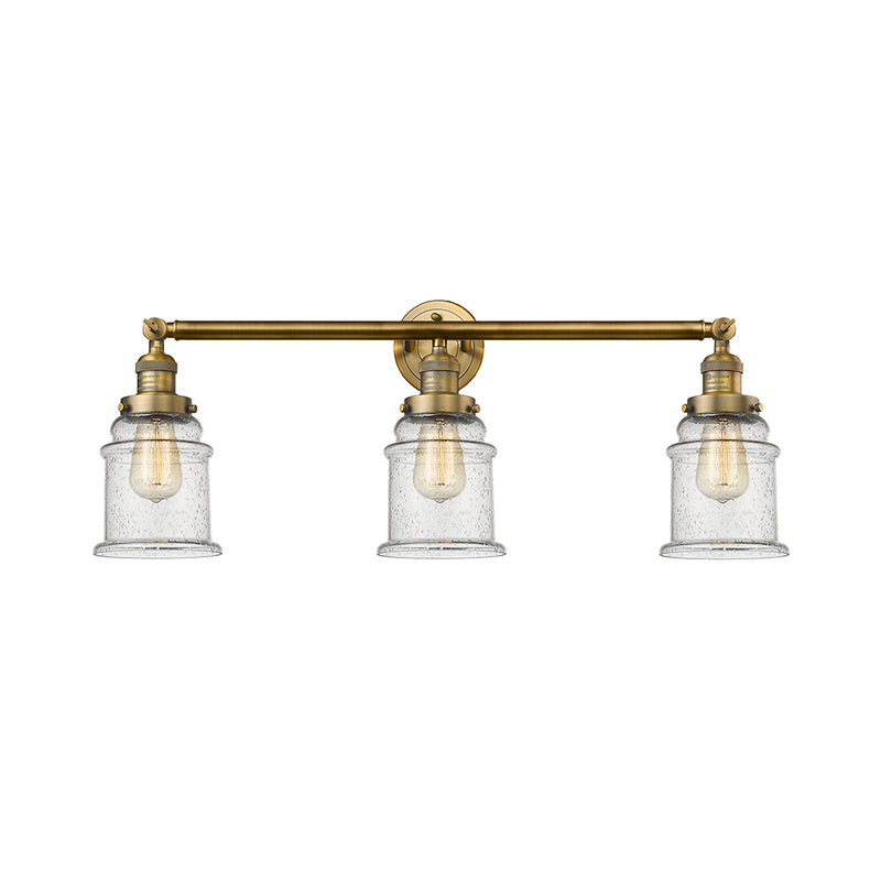 Canton Bath Vanity Light shown in the Brushed Brass finish with a Seedy shade