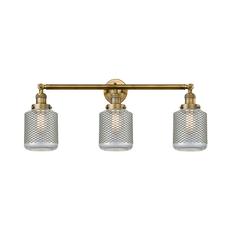Stanton Bath Vanity Light shown in the Brushed Brass finish with a Clear Wire Mesh shade