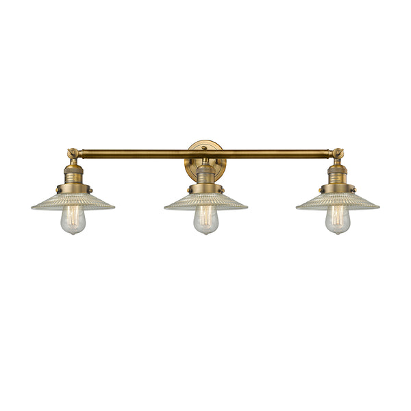 Halophane Bath Vanity Light shown in the Brushed Brass finish with a Clear Halophane shade