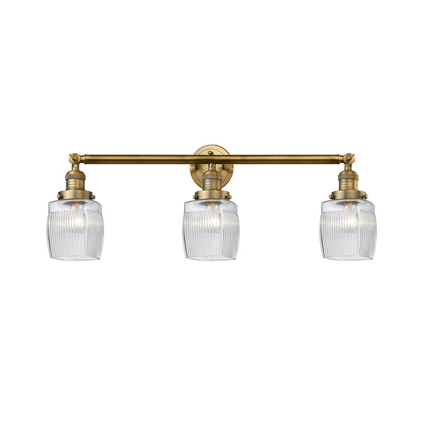 Colton Bath Vanity Light shown in the Brushed Brass finish with a Clear Halophane shade