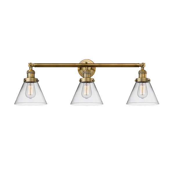 Cone Bath Vanity Light shown in the Brushed Brass finish with a Clear shade