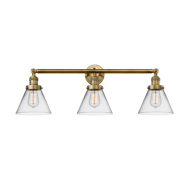 Cone Bath Vanity Light shown in the Brushed Brass finish with a Clear shade