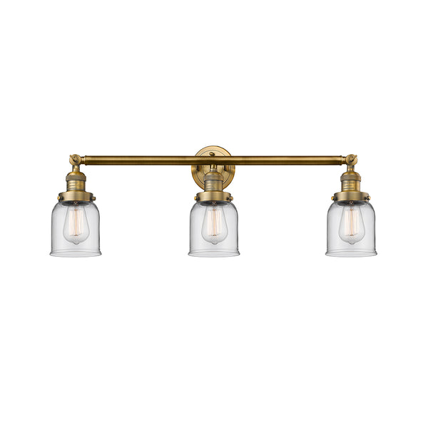 Bell Bath Vanity Light shown in the Brushed Brass finish with a Clear shade