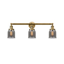 Bell Bath Vanity Light shown in the Brushed Brass finish with a Plated Smoke shade