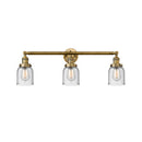 Bell Bath Vanity Light shown in the Brushed Brass finish with a Seedy shade