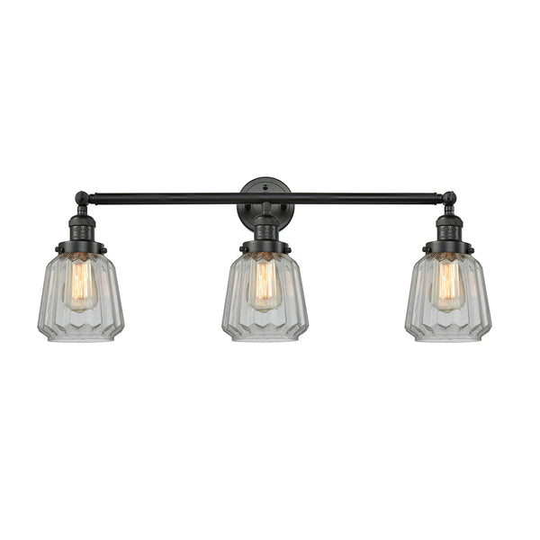 Chatham Bath Vanity Light shown in the Matte Black finish with a Clear shade