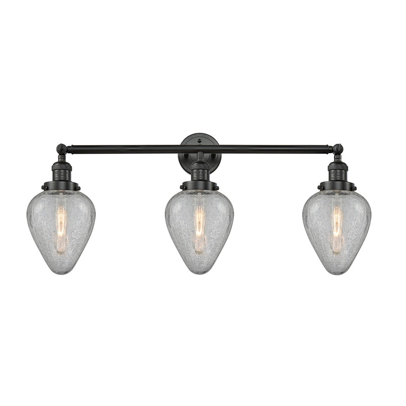 Geneseo Bath Vanity Light shown in the Matte Black finish with a Clear Crackled shade