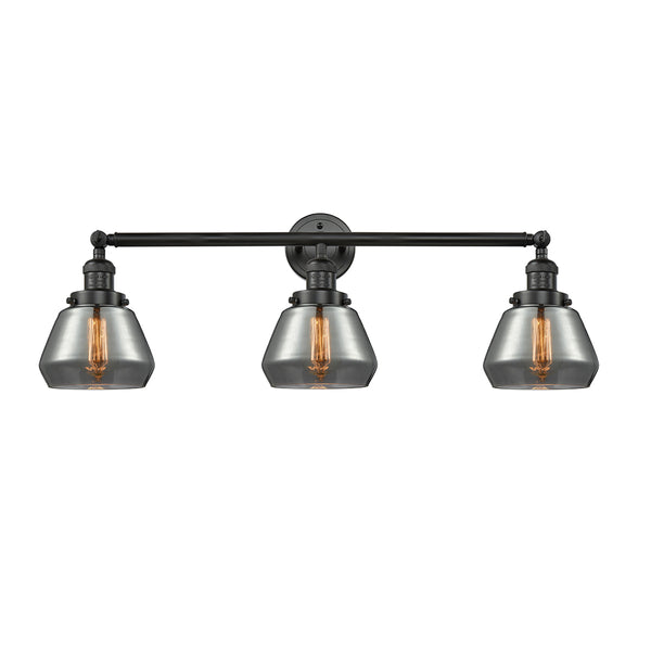 Fulton Bath Vanity Light shown in the Matte Black finish with a Plated Smoke shade