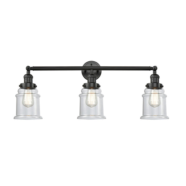 Canton Bath Vanity Light shown in the Matte Black finish with a Clear shade