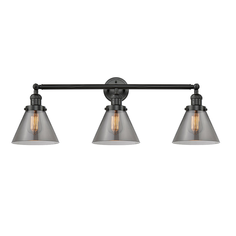 Cone Bath Vanity Light shown in the Matte Black finish with a Plated Smoke shade