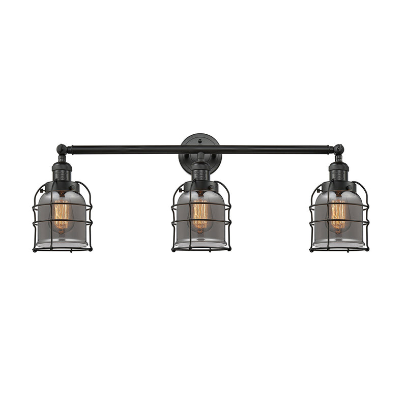 Bell Cage Bath Vanity Light shown in the Matte Black finish with a Plated Smoke shade