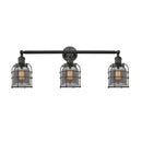 Bell Cage Bath Vanity Light shown in the Matte Black finish with a Plated Smoke shade
