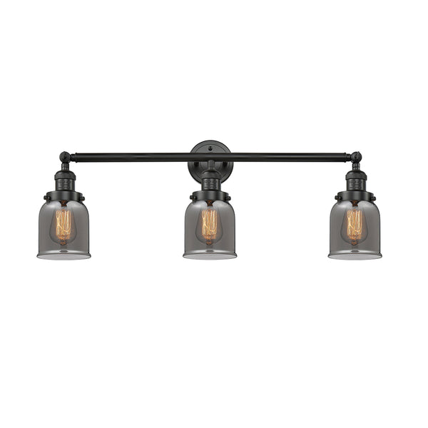 Bell Bath Vanity Light shown in the Matte Black finish with a Plated Smoke shade
