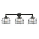 Bell Cage Bath Vanity Light shown in the Matte Black finish with a Clear shade