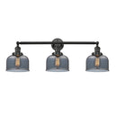Bell Bath Vanity Light shown in the Matte Black finish with a Plated Smoke shade