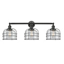 Bell Cage Bath Vanity Light shown in the Matte Black finish with a Seedy shade