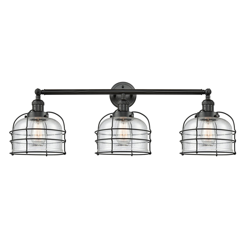 Bell Cage Bath Vanity Light shown in the Matte Black finish with a Seedy shade