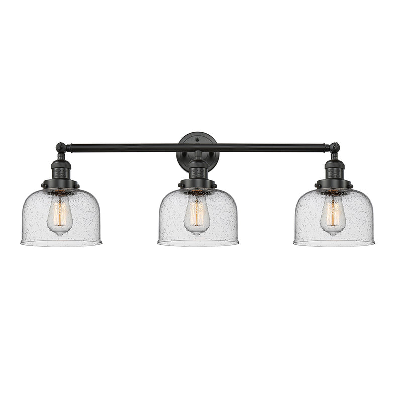 Bell Bath Vanity Light shown in the Matte Black finish with a Seedy shade
