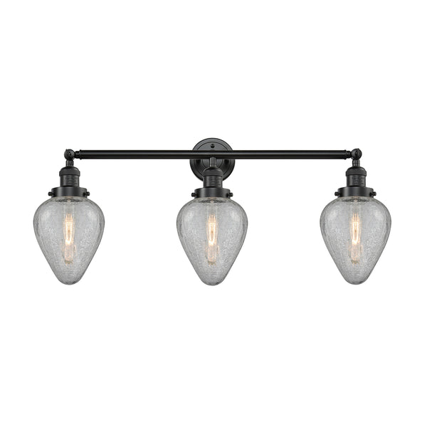 Geneseo Bath Vanity Light shown in the Oil Rubbed Bronze finish with a Clear Crackled shade