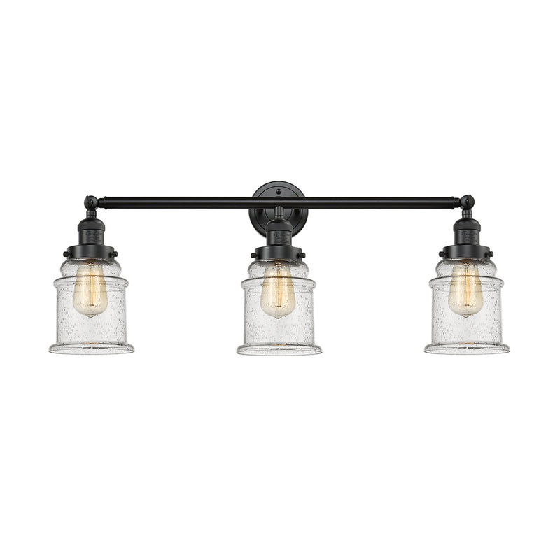 Canton Bath Vanity Light shown in the Oil Rubbed Bronze finish with a Seedy shade