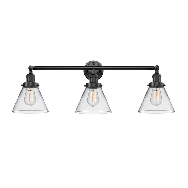 Cone Bath Vanity Light shown in the Oil Rubbed Bronze finish with a Clear shade