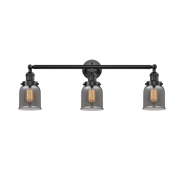 Bell Bath Vanity Light shown in the Oil Rubbed Bronze finish with a Plated Smoke shade
