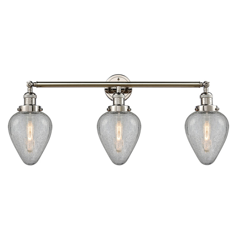 Geneseo Bath Vanity Light shown in the Polished Nickel finish with a Clear Crackled shade