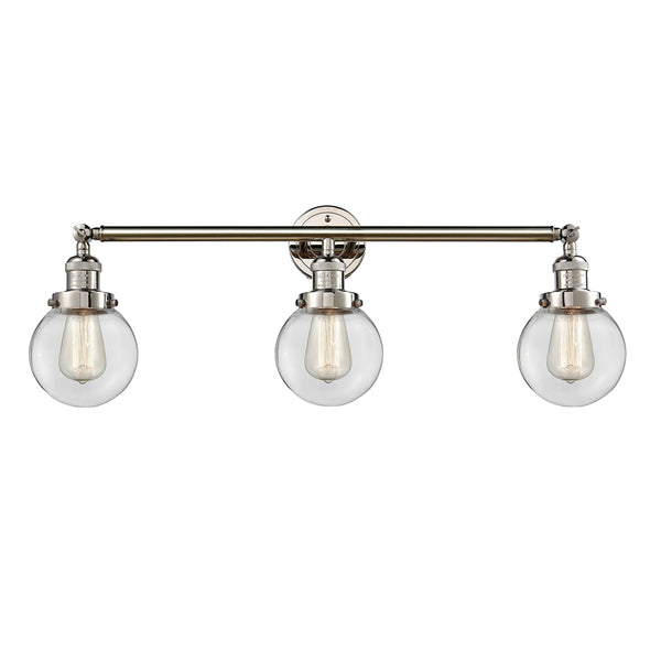 Beacon Bath Vanity Light shown in the Polished Nickel finish with a Clear shade