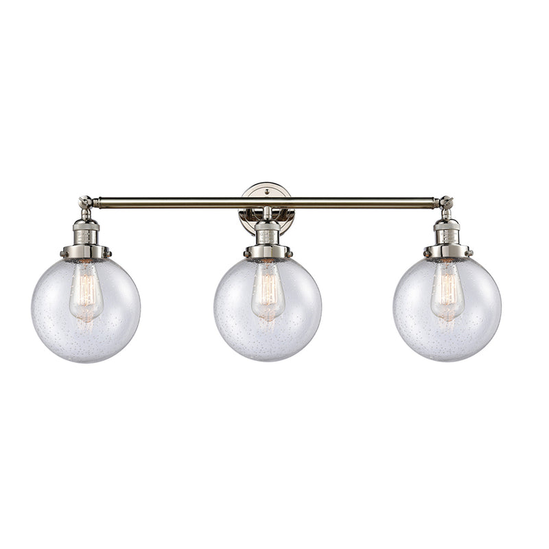 Beacon Bath Vanity Light shown in the Polished Nickel finish with a Seedy shade