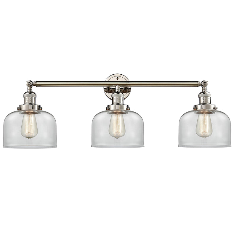 Bell Bath Vanity Light shown in the Polished Nickel finish with a Clear shade