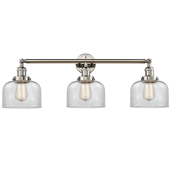 Bell Bath Vanity Light shown in the Polished Nickel finish with a Clear shade