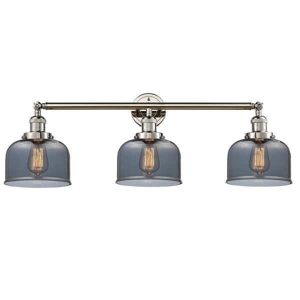 Bell Bath Vanity Light shown in the Polished Nickel finish with a Plated Smoke shade
