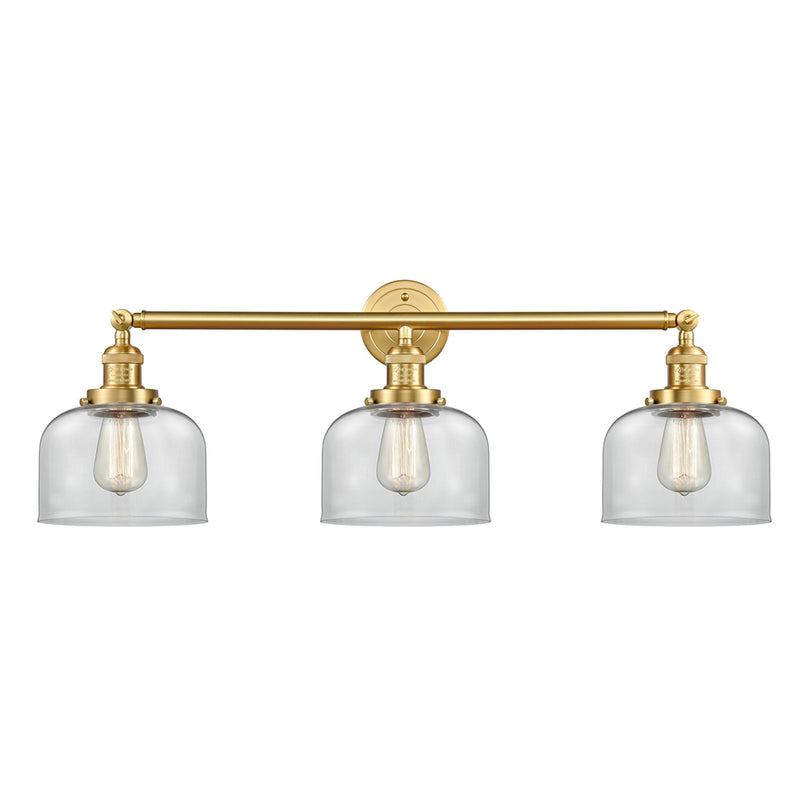 Bell Bath Vanity Light shown in the Satin Gold finish with a Clear shade