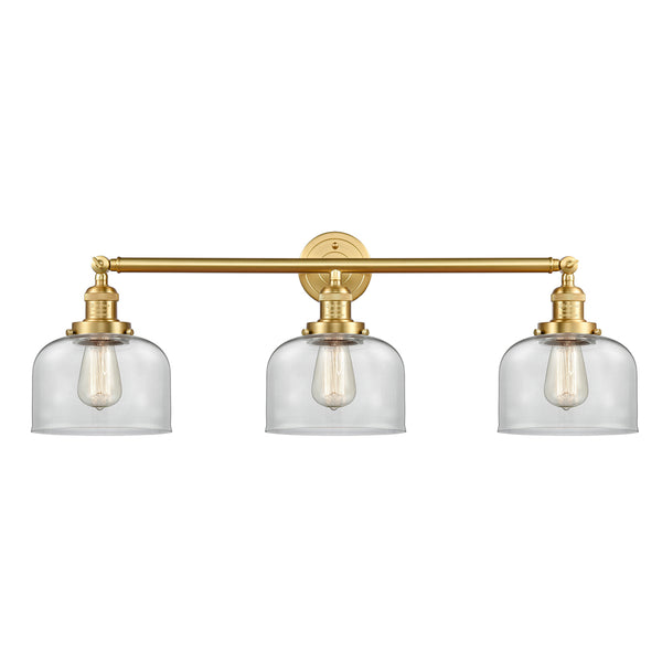 Bell Bath Vanity Light shown in the Satin Gold finish with a Clear shade