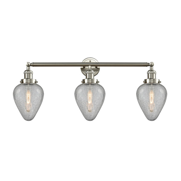 Geneseo Bath Vanity Light shown in the Brushed Satin Nickel finish with a Clear Crackled shade