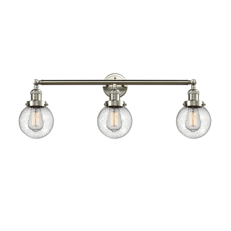 Beacon Bath Vanity Light shown in the Brushed Satin Nickel finish with a Seedy shade