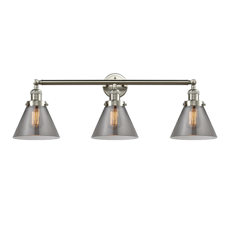 Cone Bath Vanity Light shown in the Brushed Satin Nickel finish with a Plated Smoke shade