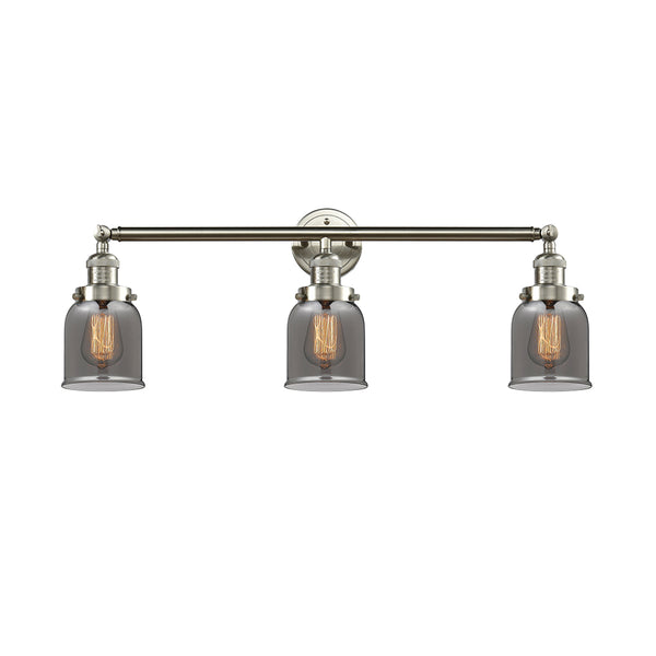Bell Bath Vanity Light shown in the Brushed Satin Nickel finish with a Plated Smoke shade