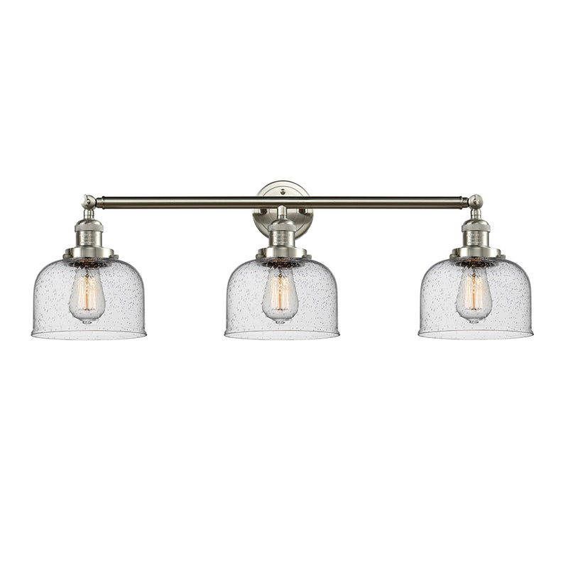 Bell Bath Vanity Light shown in the Brushed Satin Nickel finish with a Seedy shade