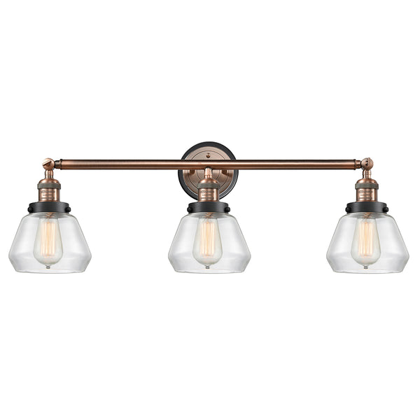 Fulton Bath Vanity Light shown in the Antique Copper finish with a Clear shade