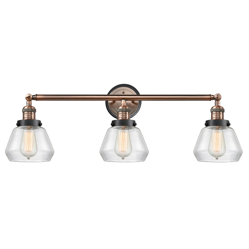 Fulton Bath Vanity Light shown in the Antique Copper finish with a Clear shade