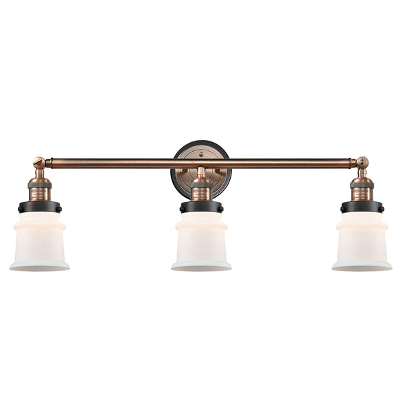 Canton Bath Vanity Light shown in the Antique Copper finish with a Matte White shade