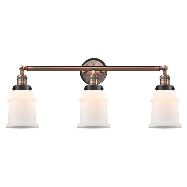 Canton Bath Vanity Light shown in the Antique Copper finish with a Matte White shade