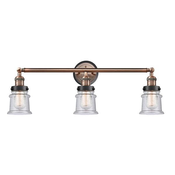 Canton Bath Vanity Light shown in the Antique Copper finish with a Seedy shade