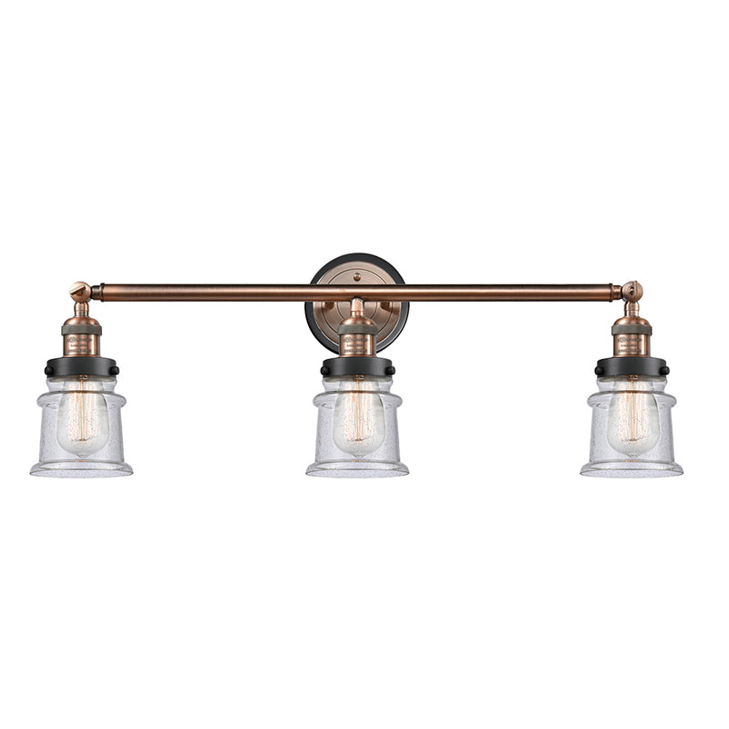 Canton Bath Vanity Light shown in the Antique Copper finish with a Seedy shade