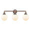 Beacon Bath Vanity Light shown in the Antique Copper finish with a Matte White shade