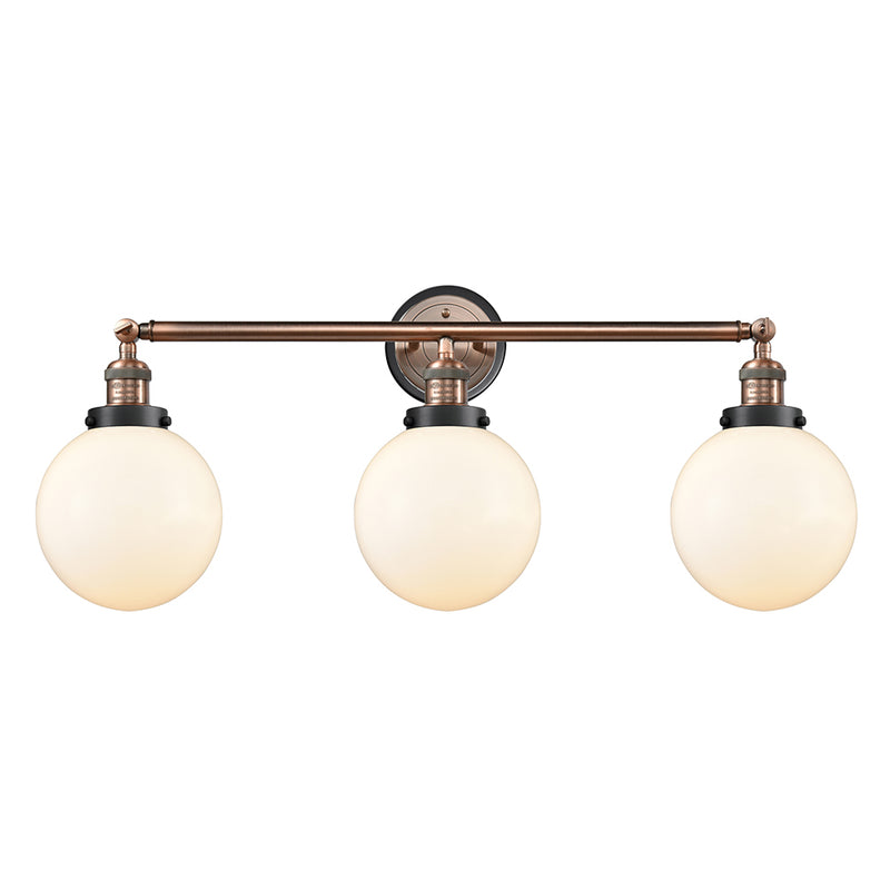 Beacon Bath Vanity Light shown in the Antique Copper finish with a Matte White shade